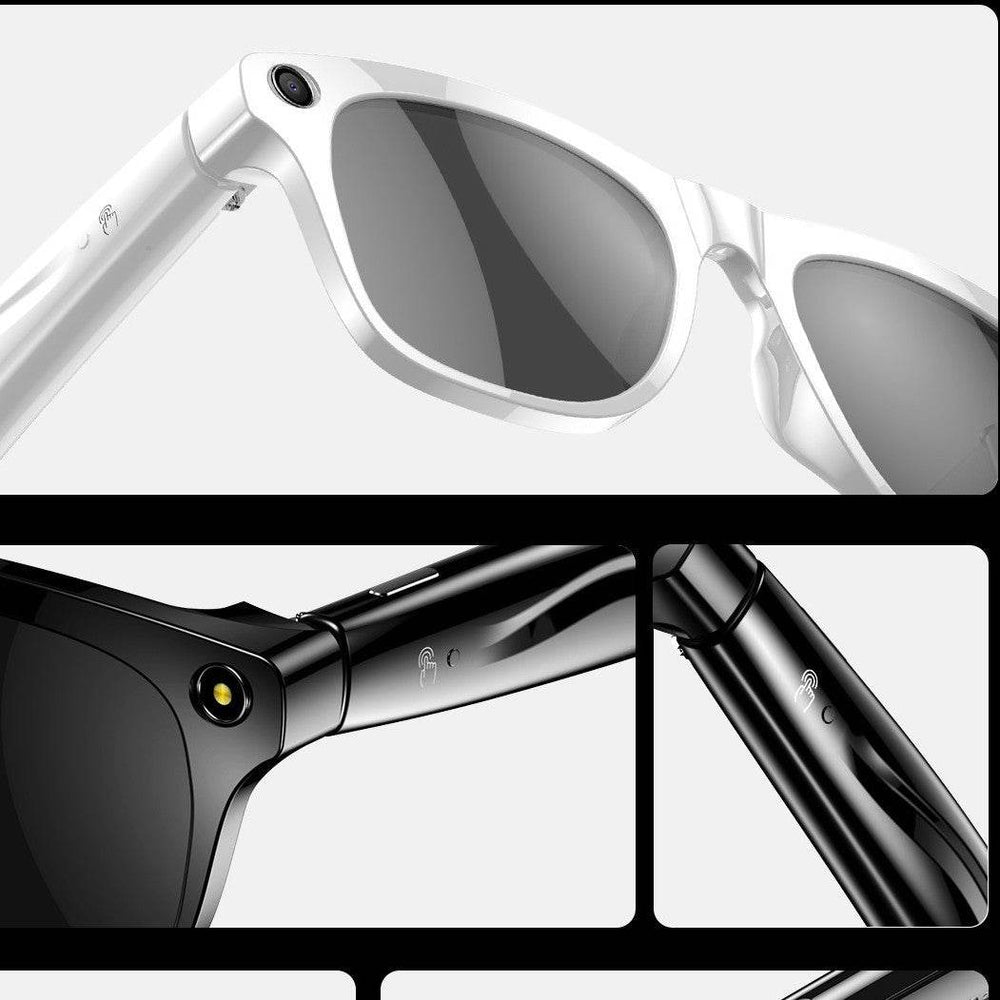 Close-up of white and black sunglasses with reflective lenses on a light gray background.