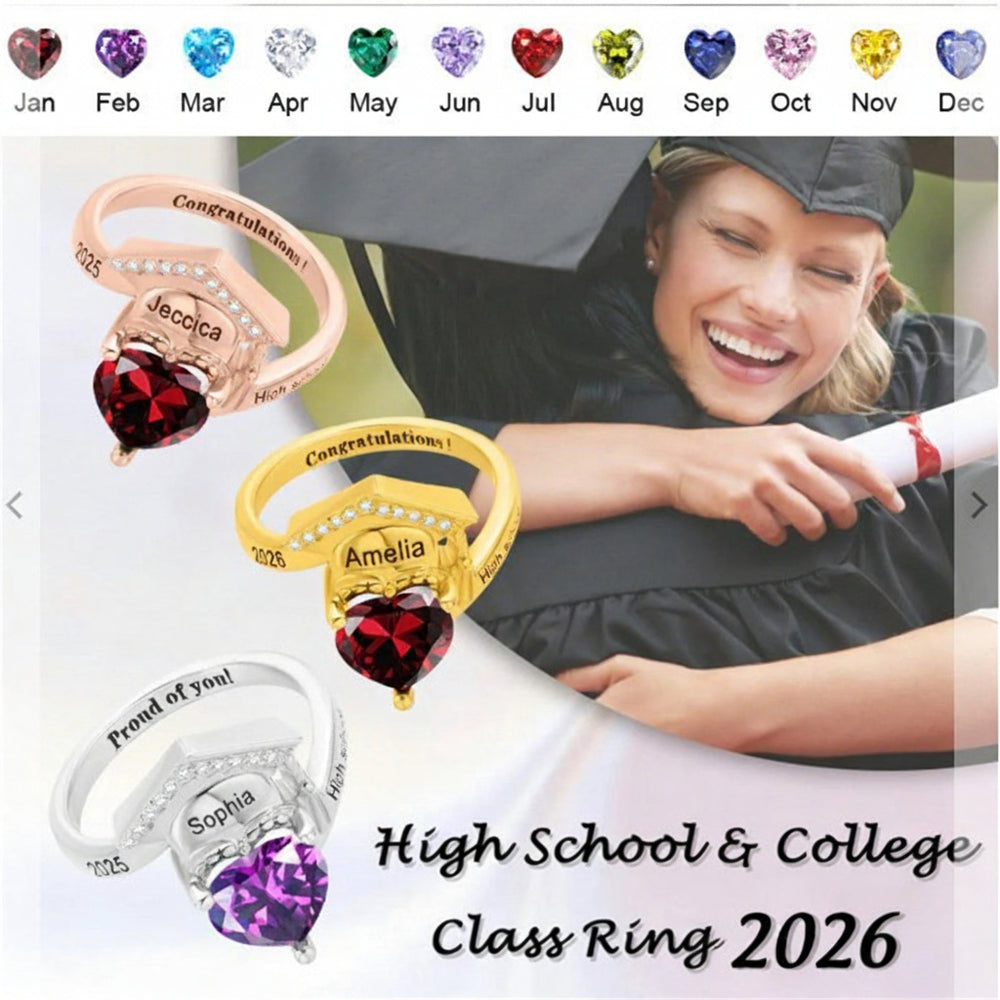Graduation-themed class ring with heart-shaped gemstones and personalized names, displayed with a person in graduation attire.