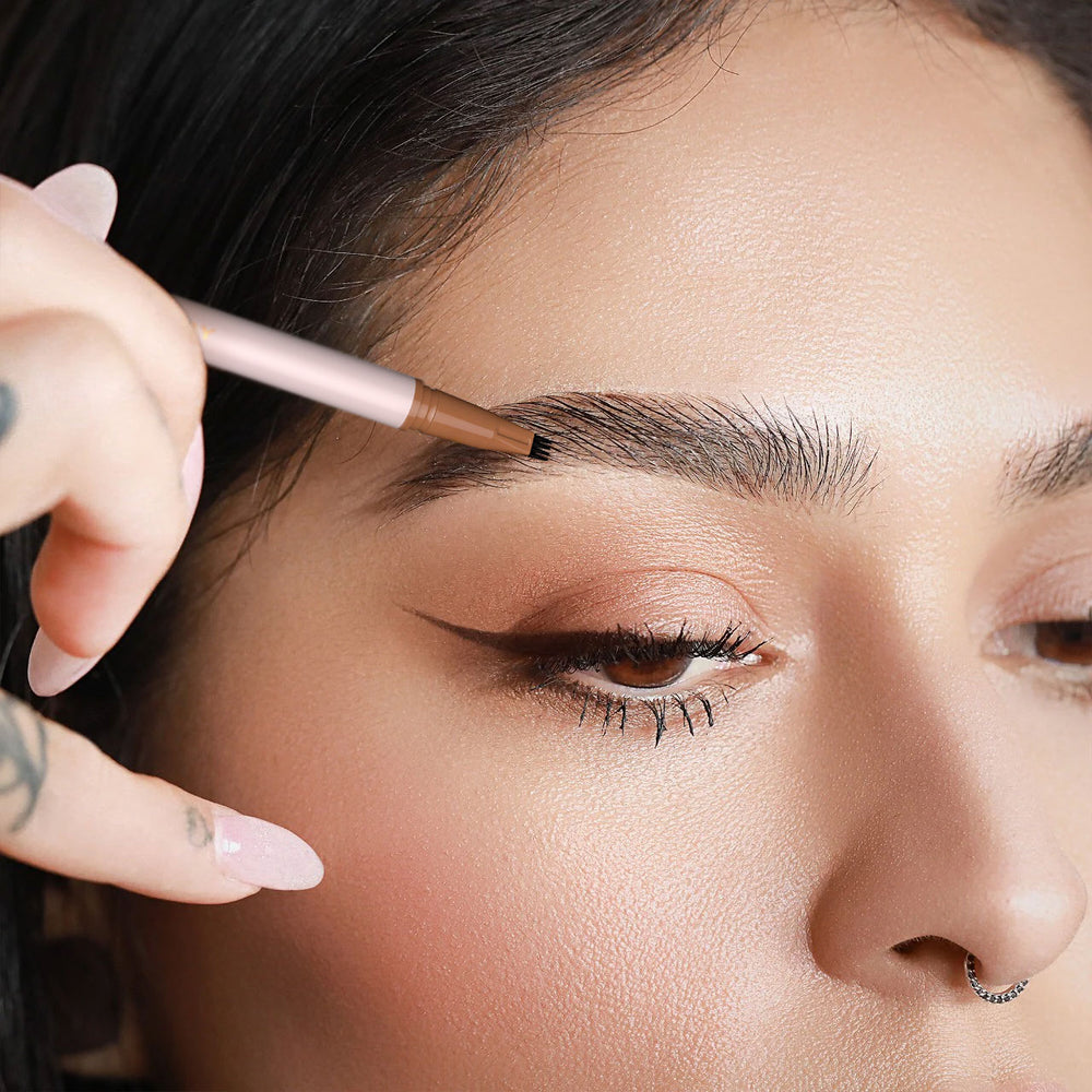 Person applying eyebrow makeup with a pencil