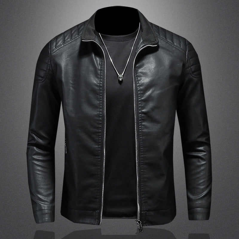 Black leather jacket on a gray background