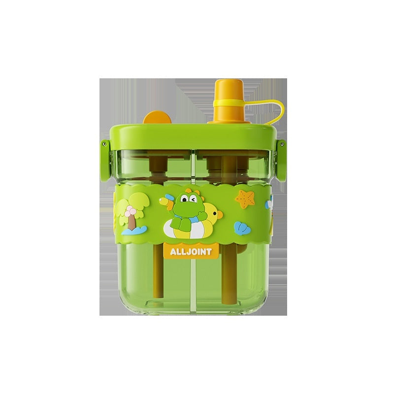 Green children's juice extractor with cartoon designs on a white background