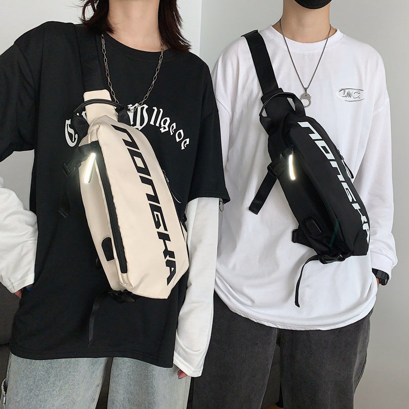 Two people wearing crossbody bags with visible branding against a neutral background