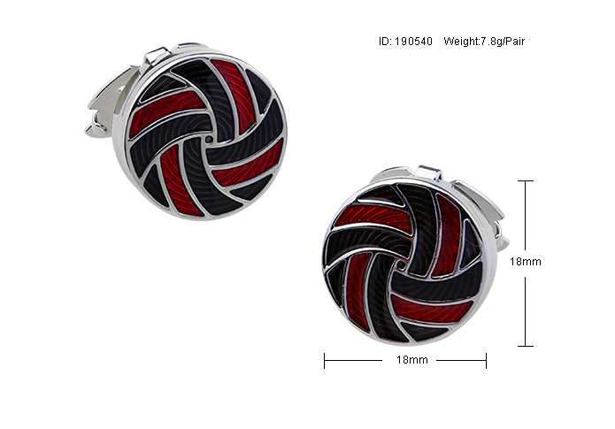Pair of cufflinks with red and black design on a white background