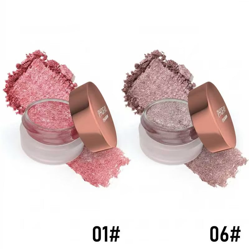 Two jars of pink makeup powder with rose gold lids on a white background.