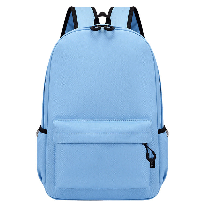 Light blue backpack with black zippers on a white background