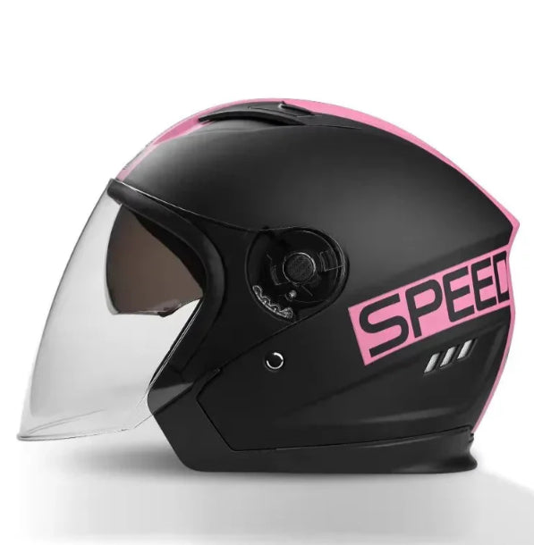 Black motorcycle helmet with pink 'SPEED' logo on a white background