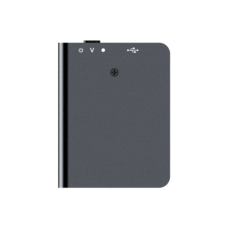 Black electronic device with power button and USB port on a white background