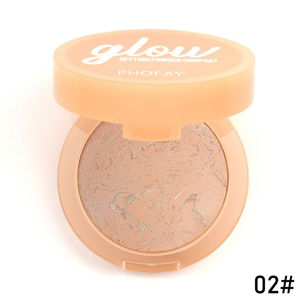 Compact powder with a peach-colored lid labeled 'glow' on a white background