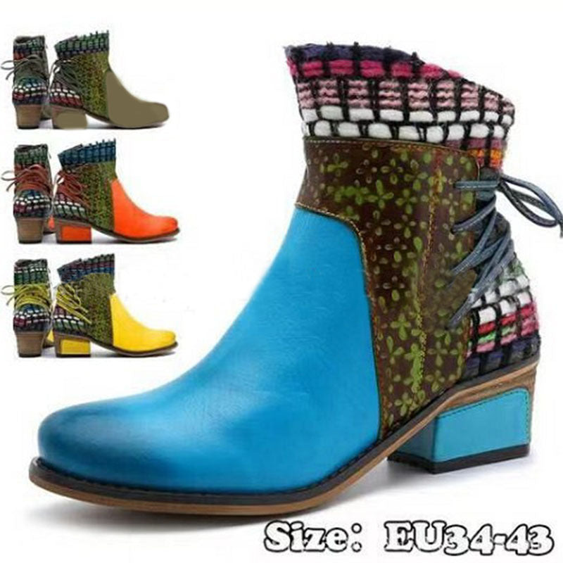 Colorful patterned boots with a blue sole on a white background