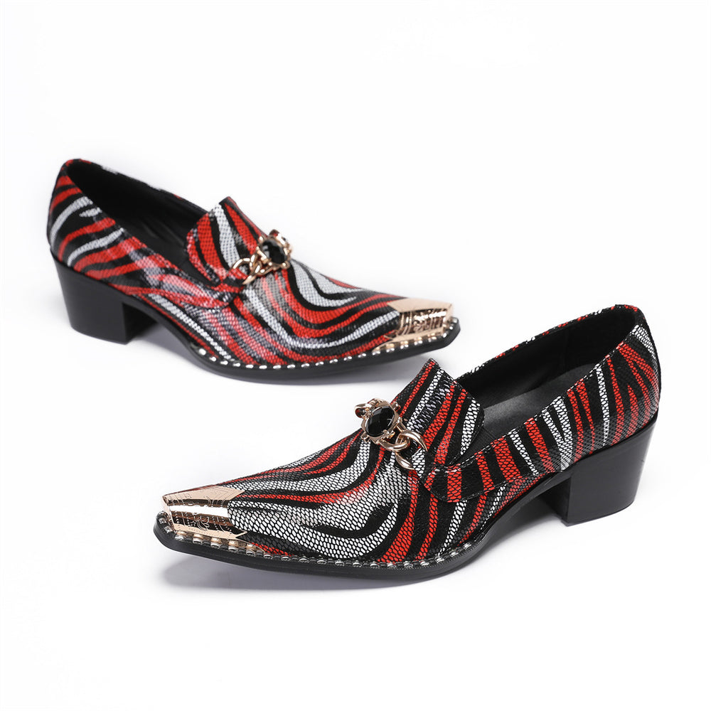 Pair of red, black, and white patterned shoes on a white background
