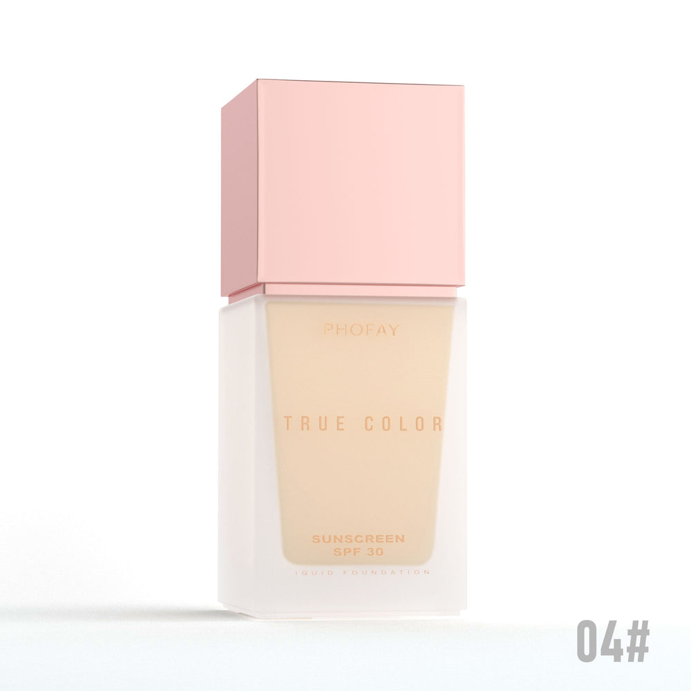Sunscreen bottle with pink cap and beige body on a white background