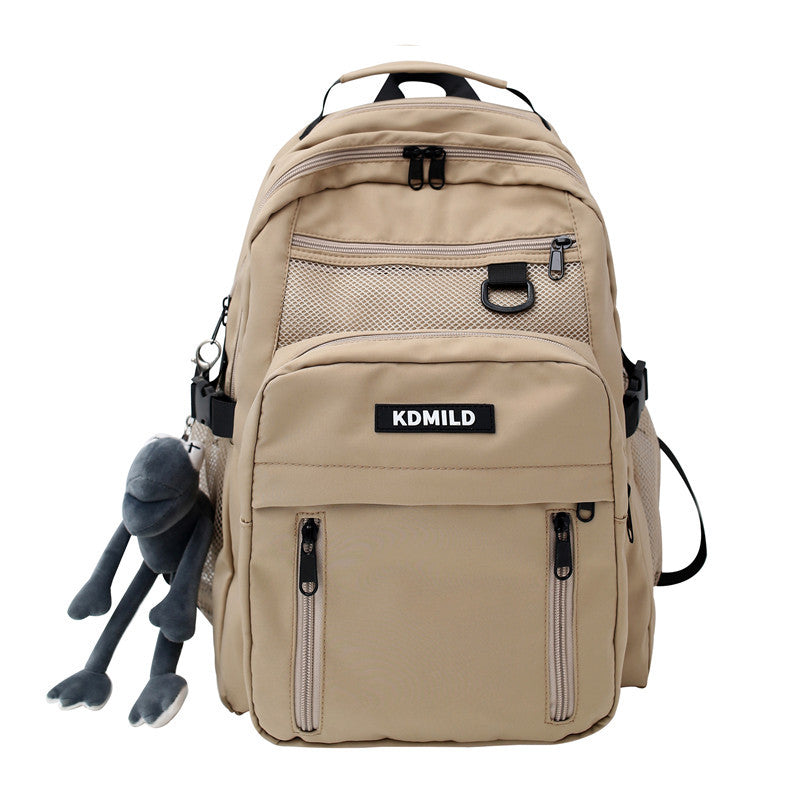 Beige backpack with multiple pockets and a visible brand label on a white background