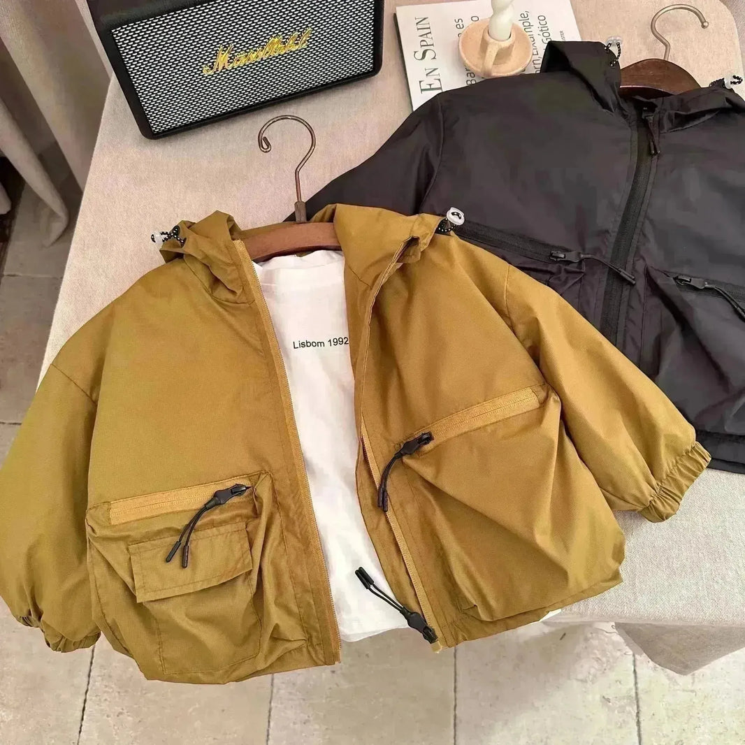 Veste de coquille de capuche de couleur unie de garçon