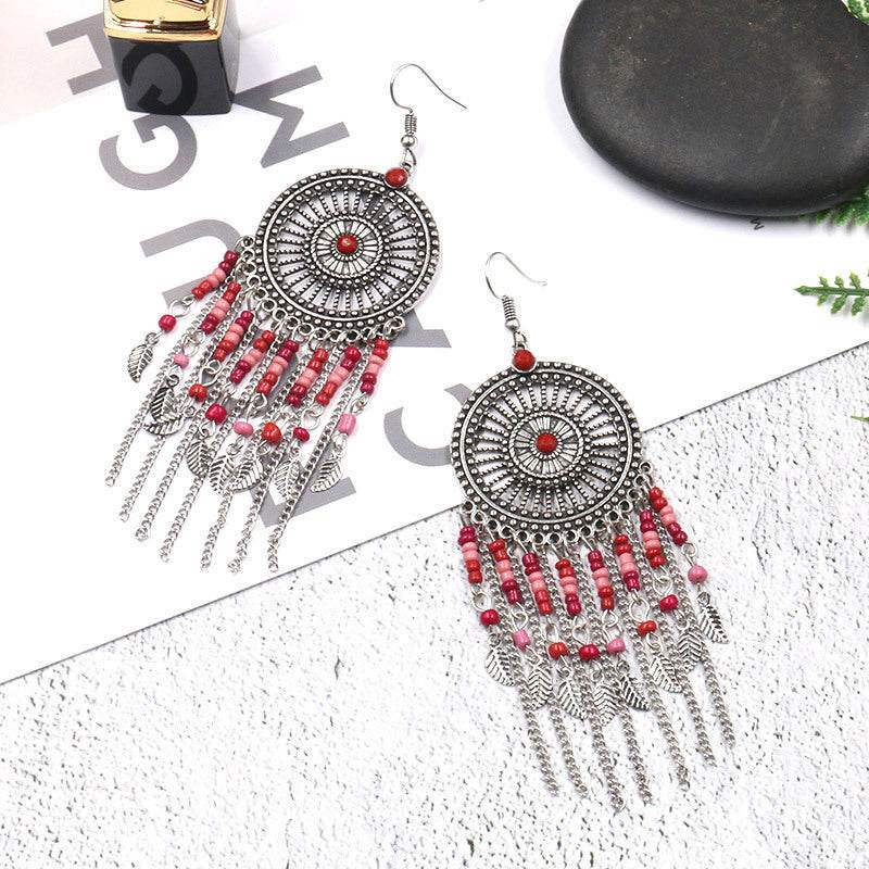 Beaded fringed hollow earrings - EX-STOCK Canada