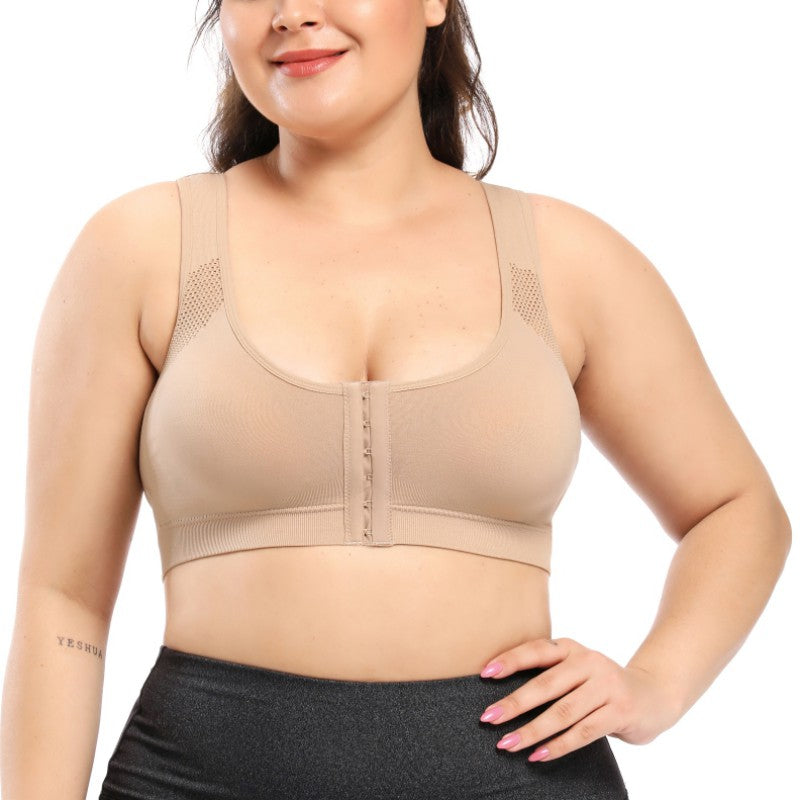 Woman wearing a beige compression garment on a white background