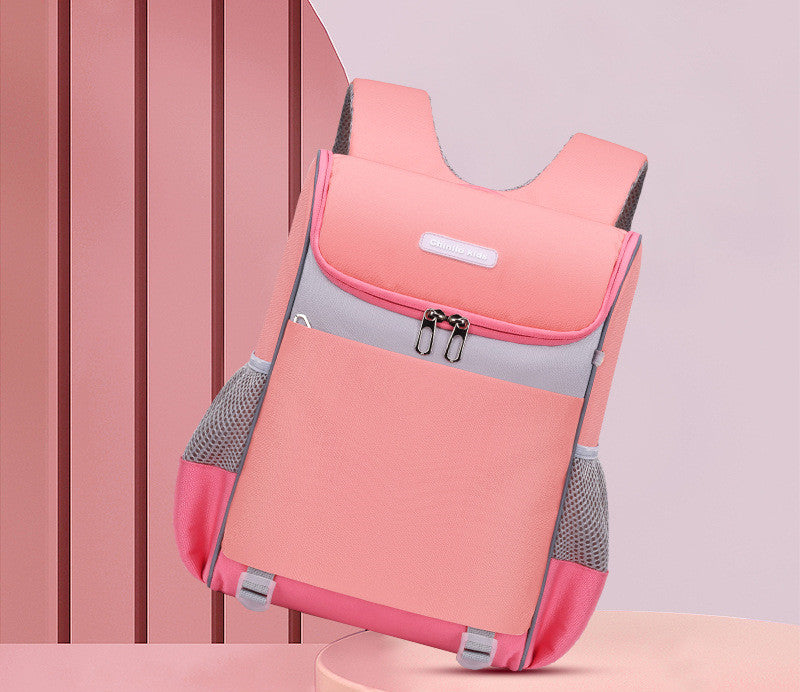 Pink backpack with gray accents on a pink background