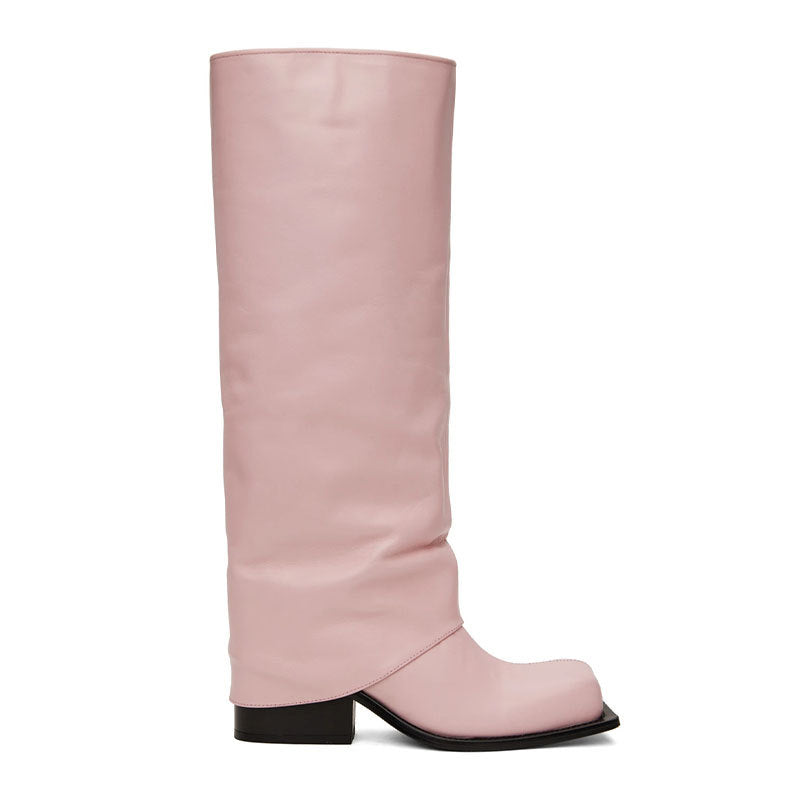 Pink knee-high boot with a black sole on a white background