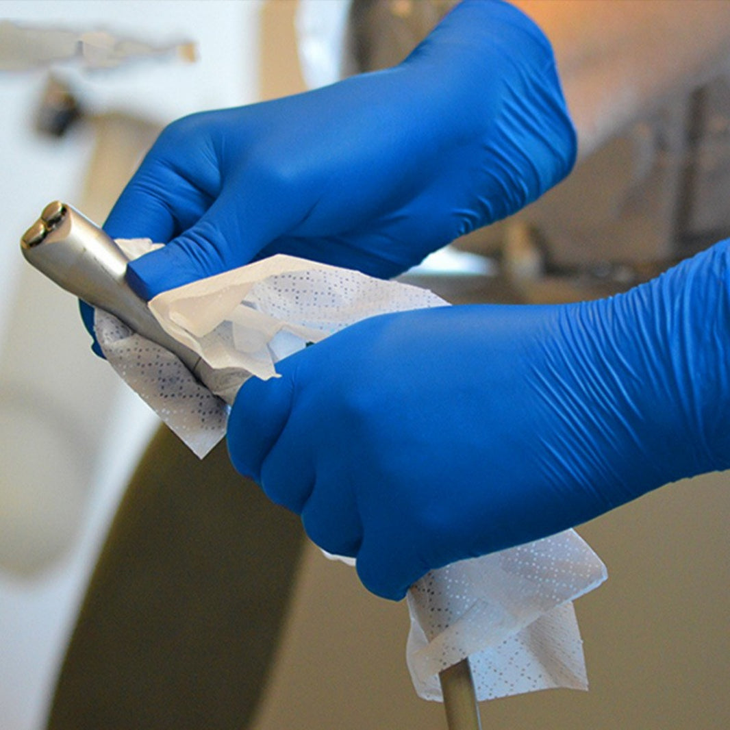 Guanti monouso in nitrile senza polvere né superficie ruvida
