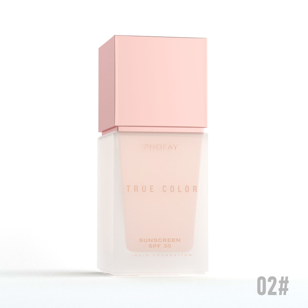 Sunscreen bottle with pink cap and body on a white background