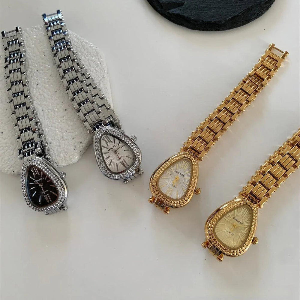 Montre Femme Chaîne Somptueuse Tête de Serpent DoréeEX-STOCK Canada
