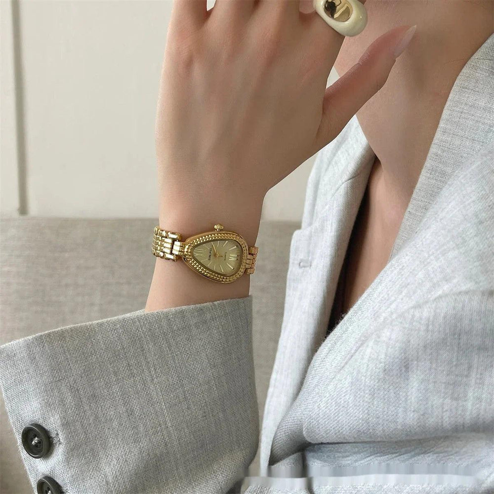 Montre Femme Chaîne Somptueuse Tête de Serpent DoréeEX-STOCK Canada