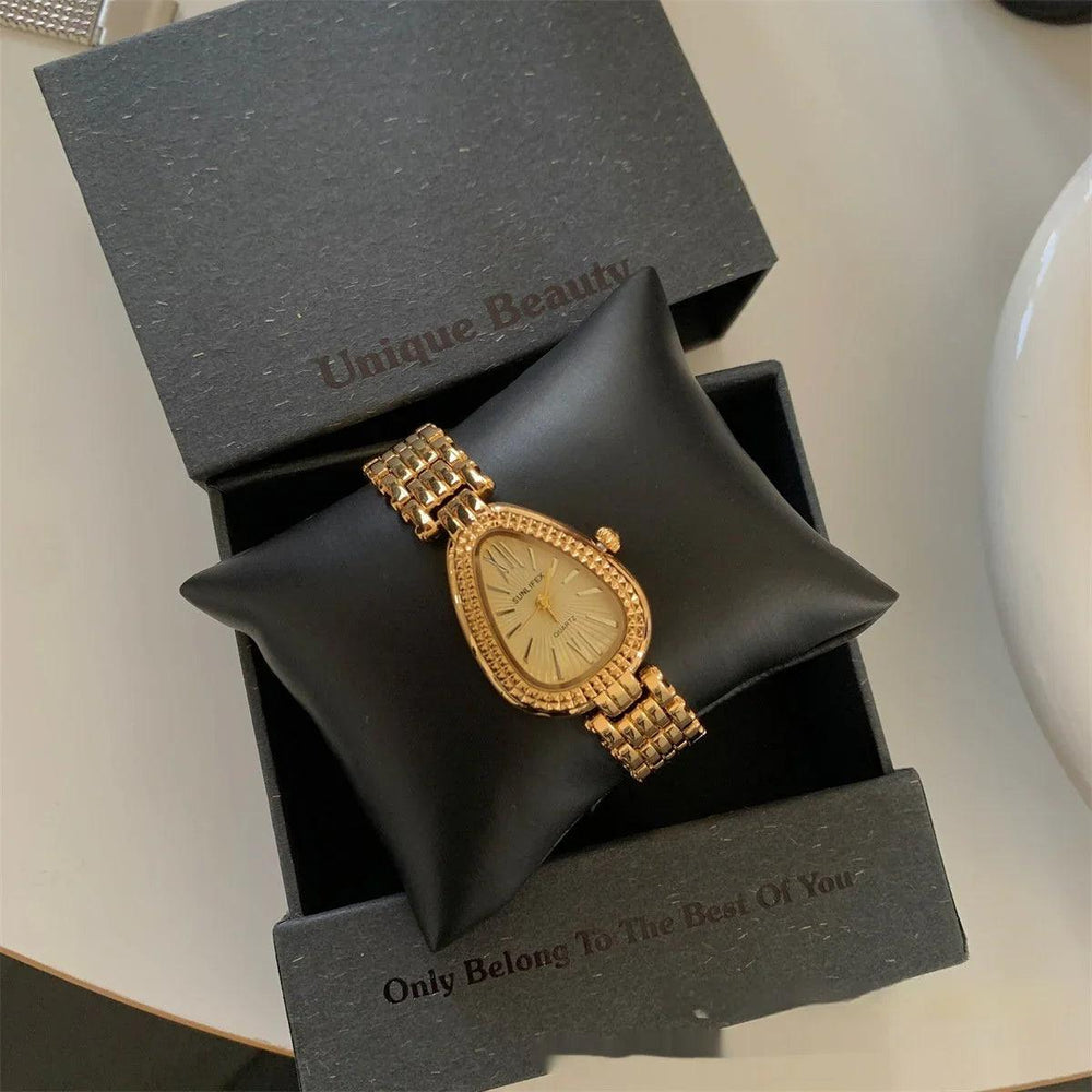 Montre Femme Chaîne Somptueuse Tête de Serpent DoréeEX-STOCK Canada