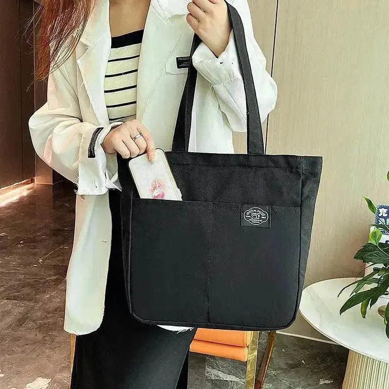 حقائب يد قماشية بأسلوب بريبي للنساء بلون صلب بسعة كبيرة بسيطة حقيبة كتف يومية بجيوب متعددة حقائب تسوق فتيات طلاب حقيبة يد توت. EX-STOCK Canada