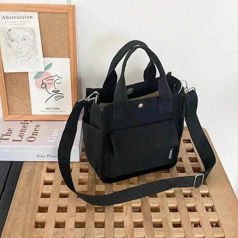Borsa a tracolla in tela tridimensionale con multi tasche - EX-STOCK Canada