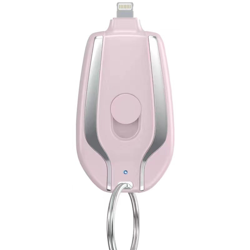 Pink electronic device with a keychain attachment on a white background