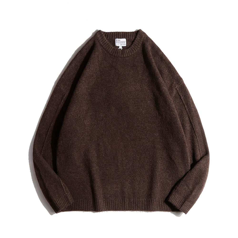 Brown sweater on a white background