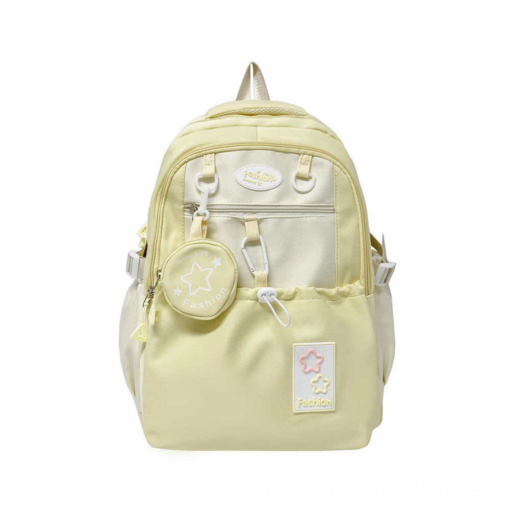 Light yellow backpack with star designs on a white background
