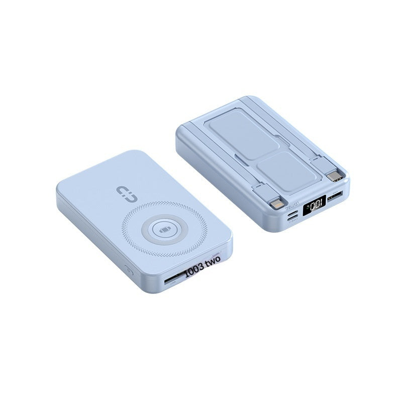 A light blue portable power bank shown from two angles on a plain white background. One view shows the front with a circular button and the text '1000 two', while the other shows the back with port covers and a small digital display.