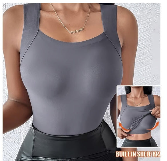 Gray tank top with built-in shelf bra worn by a person, on a light gray background.