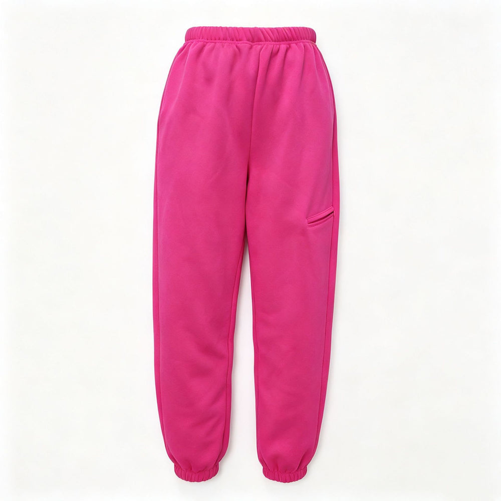 Bright pink jogger-style pants with an elastic waistband and elastic cuffs, shown flat against a plain white background.