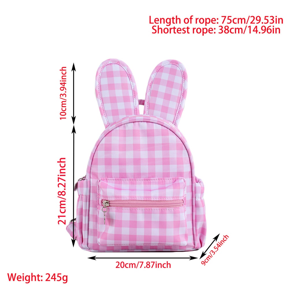 Pink and white checkered bunny backpack with red text showing dimensions and weight on a white background.