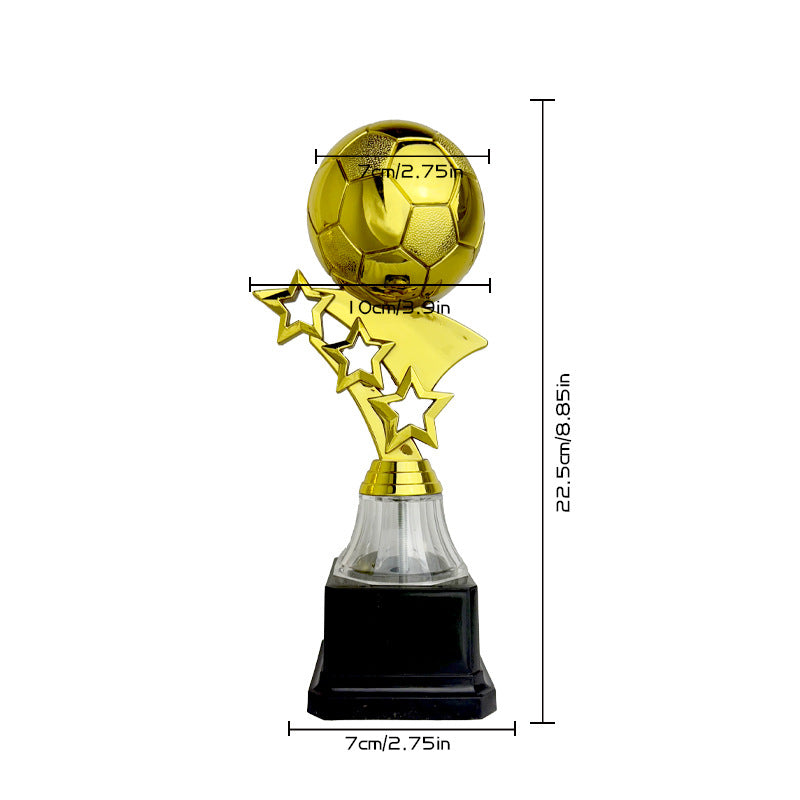 A gold soccer ball trophy on a star-shaped stem with a clear glass neck and black base, shown with dimension lines and measurements on a white background.