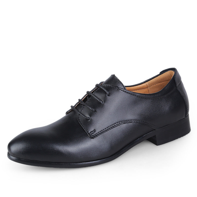 Black leather dress shoe on a white background