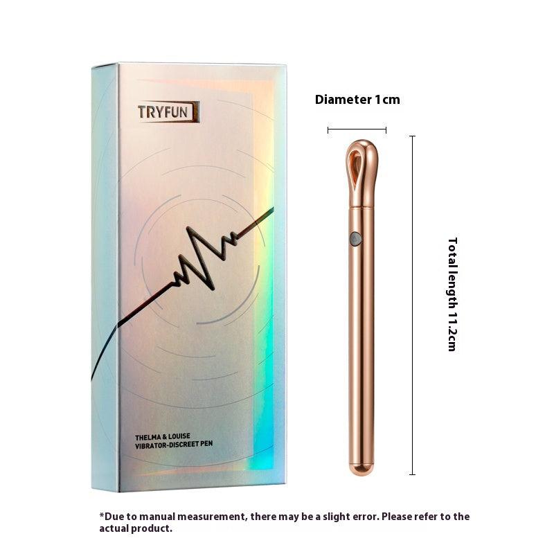 Vibromasseur en or rose, emballage et mesures sur un fond blanc