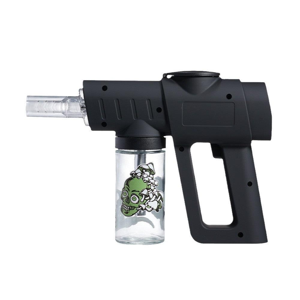 Appareil portatif noir avec un conteneur transparent présentant un design vert sur fond blanc