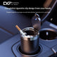 A black cylindrical cigarette holder with an open clip lid, shown in a car cup holder with a cigarette resting inside. White marketing text at the top reads 'DXF Car Small Bubble Car Bubble' and 'Thoughtful cigarette clip design frees your hands.