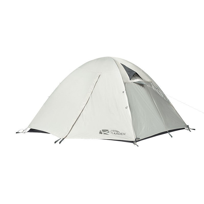 A dome-style camping tent in light gray with a small front window and visible tent pegs, photographed on a plain white background. The brand name 'Tentmaker' is printed near the lower front.