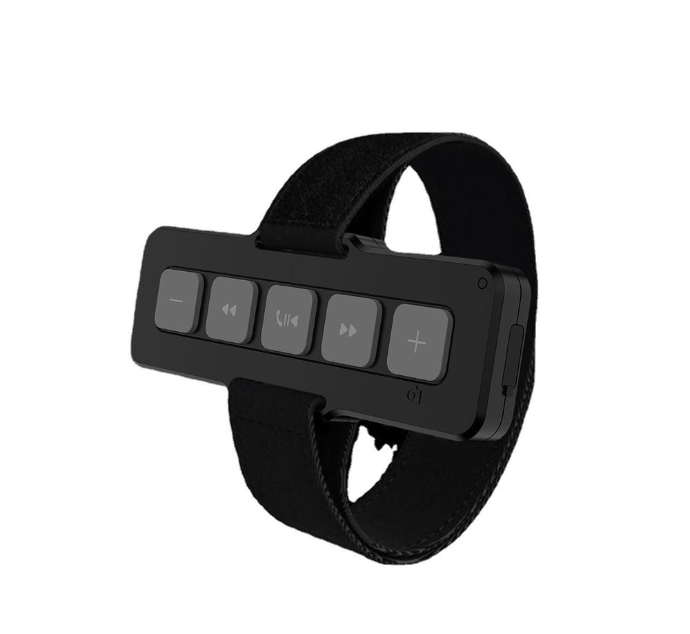 Black Bluetooth car kit with control buttons on a white background