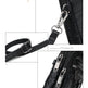 Close-up of a black bag with metal hardware including a clip and zippers.