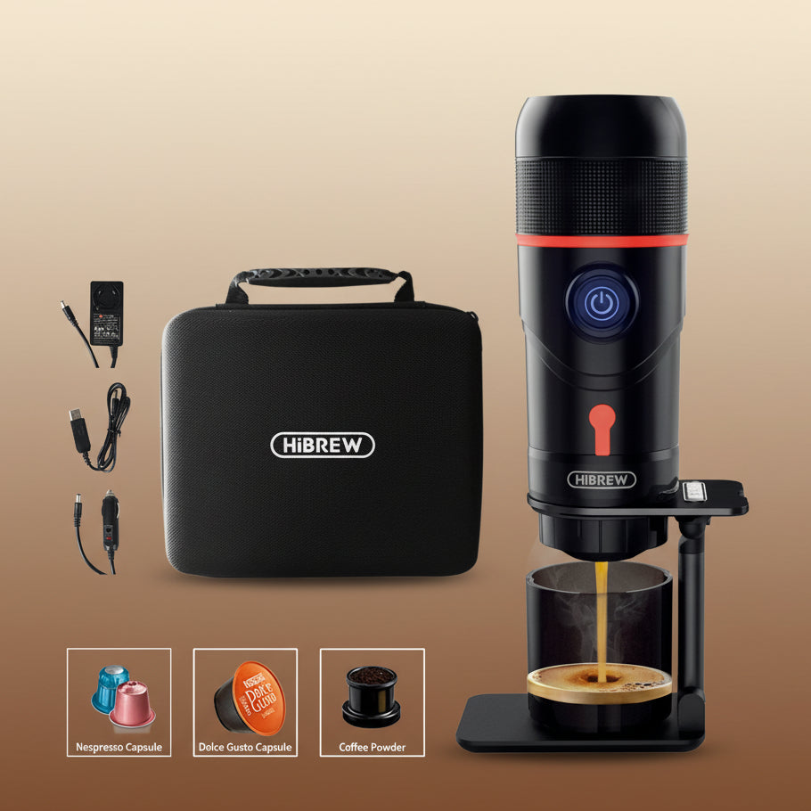 Black and red portable coffee maker with accessories on a white background