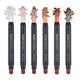Set of six cosmetic pencils with decorative tips on a white background