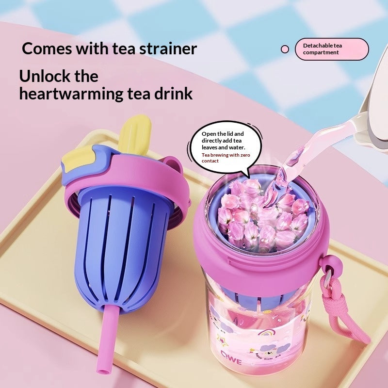 Pink and purple tea tumbler with tea strainer on a colorful background