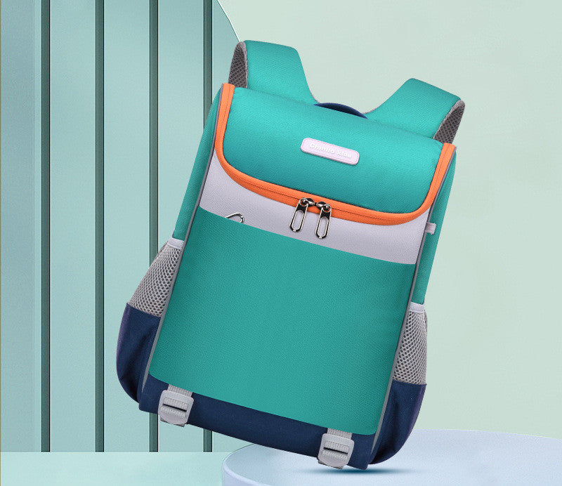 Green and orange backpack on a light blue background