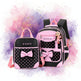 Black and pink polka dot backpack with a smaller matching lunch bag on a white background.