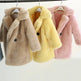 Three children's fur coats in beige, yellow, and pink hanging on a rack.
Kids Teddy Bear Faux Fur Coat | Children's Winter Overcoat White Brown Pink Beige Blue Yellow 90–140cm