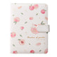 Notebook with peach pattern and decorative elements on a white background
